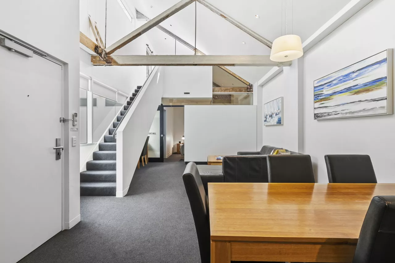 The living area inside the 2 Bedroom Loft Apartment